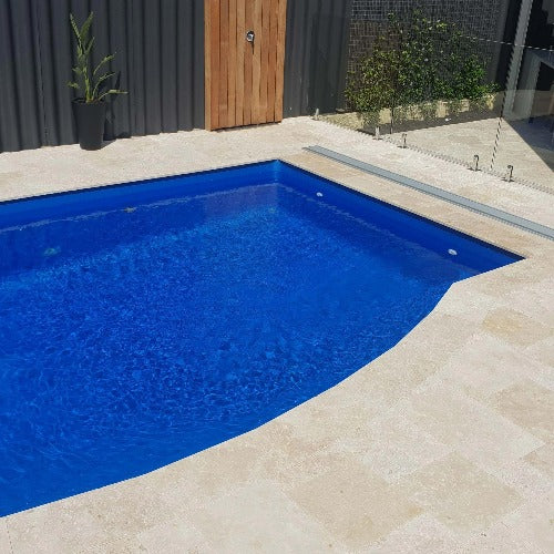 Concealed in-ground pool cover roller with Daisy solar pool blanket
