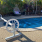 Swimming pool cover with roller