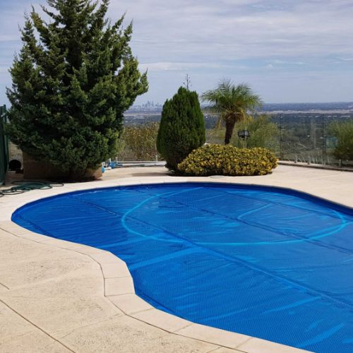Daisy UltraDome 525B pool cover on residential swimming pool
