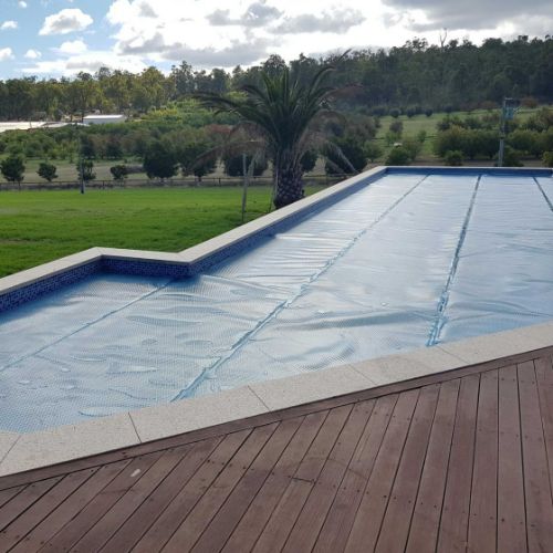 Titanium Blue pool blanket for heated swimming pool
