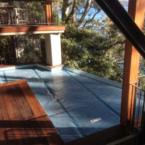 525 micron Titanium Blue Daisy solar pool cover
