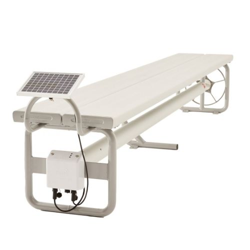 Daisy Under Bench Pool Cover Roller (Powered) in Clear Anodised beside a modern swimming pool