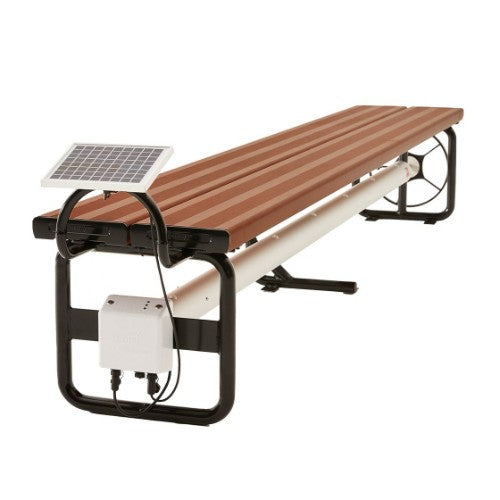 Daisy Under Bench Pool Cover Roller (Powered) in Western Red Cedar beside a luxury swimming pool
