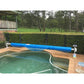 Premium Daisy electric pool roller beside a residential swimming pool