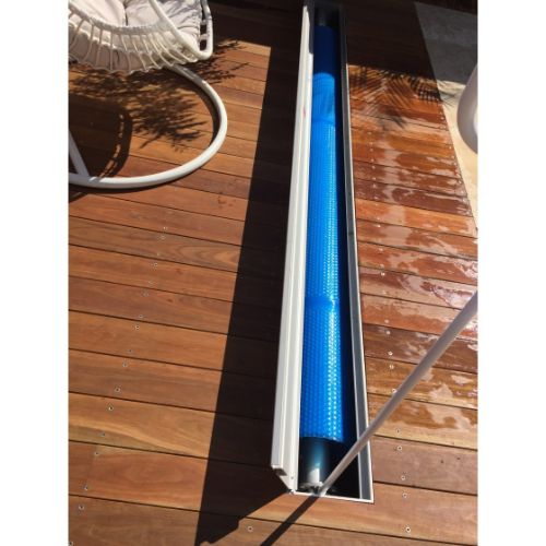 Close-up of Daisy DMR hidden pool cover roller mechanism and anodised lid