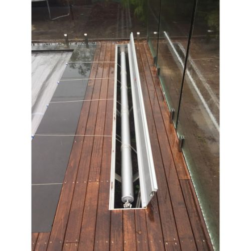 Hidden pool cover roller system by Daisy DMR in a modern Australian backyard